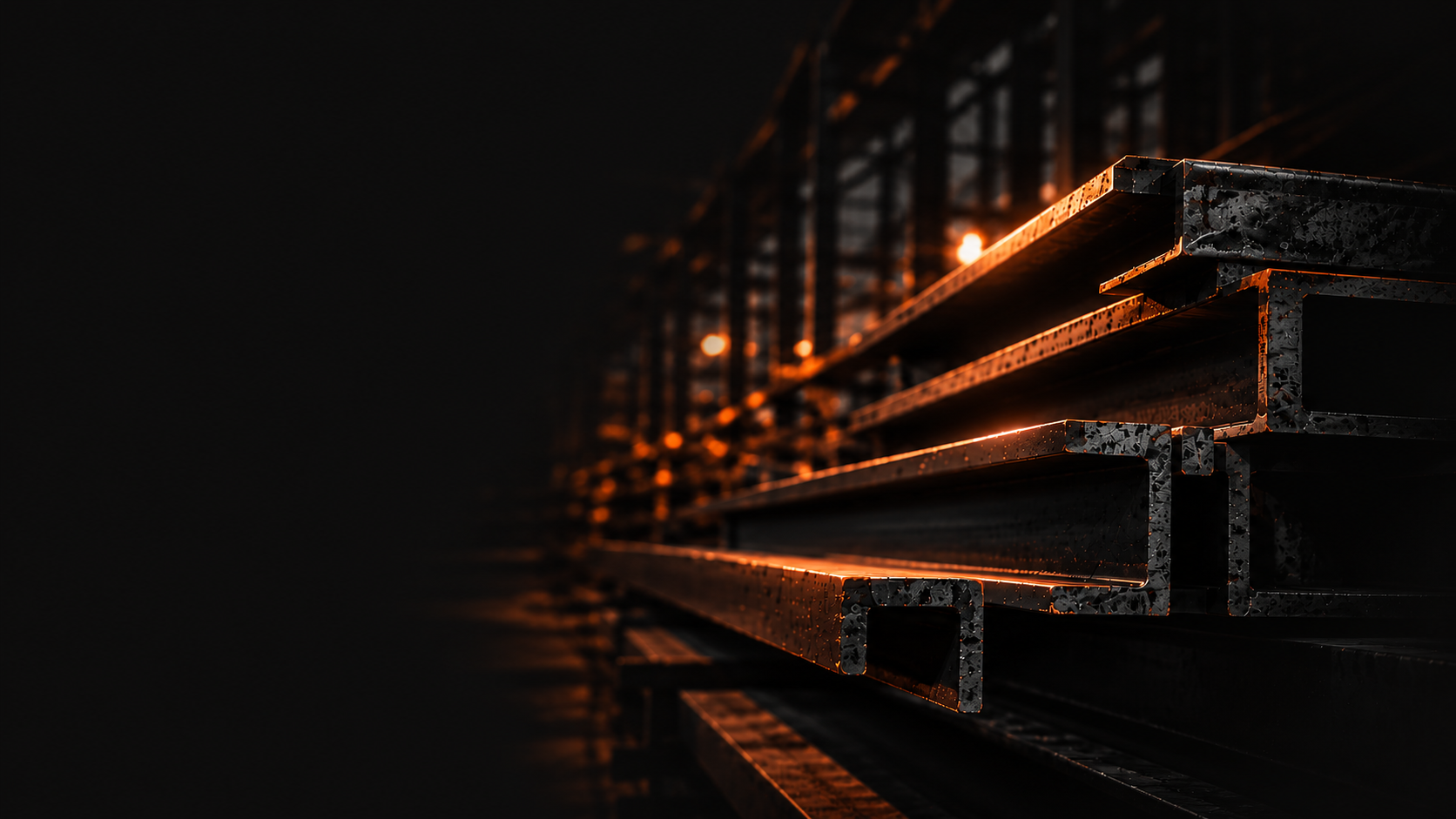 Stacked steel beams in a warehouse